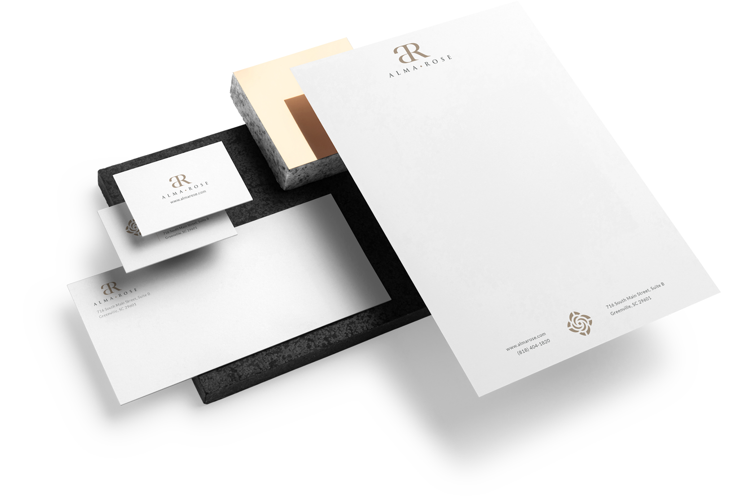 Branded stationery design for Alma Rose created by Urge Interactive, featuring elegant letterhead, business cards, and cohesive brand identity for a medical aesthetics practice
