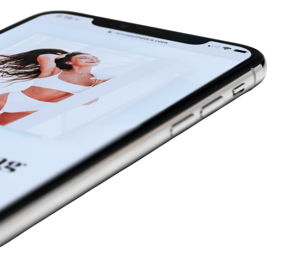 Image of a mobile device showing RKM's website