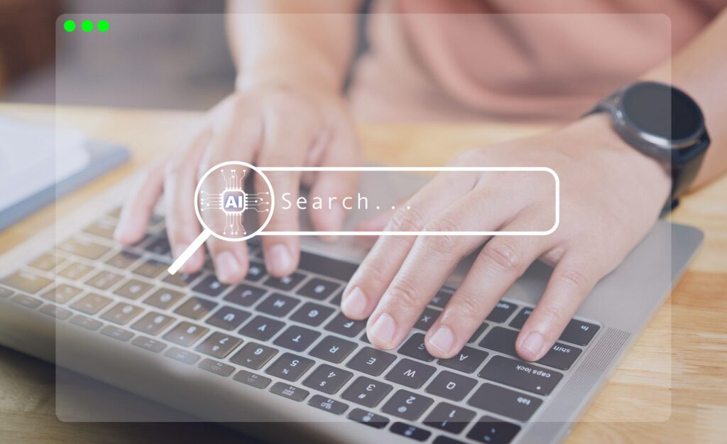Photo of a man using AI search on his computer