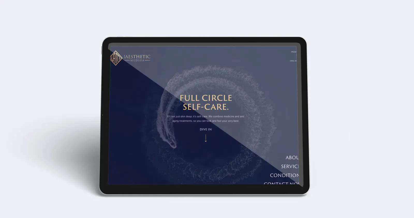 The iAesthetic website playing on a tablet.
