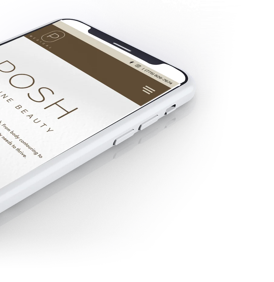 The Posh Medical homepage on a phone, tilted.